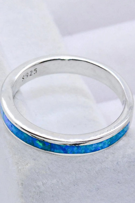 Elegant sterling silver ring with a mesmerizing sky blue opal gemstone, a modern and sophisticated accessory.