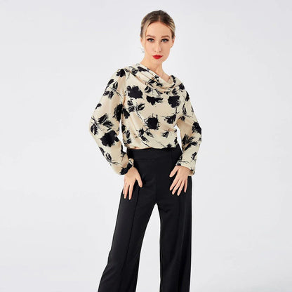 Elegant ladies' blouse with a printed pattern, dropped collar, and long sleeves in a classic white colour