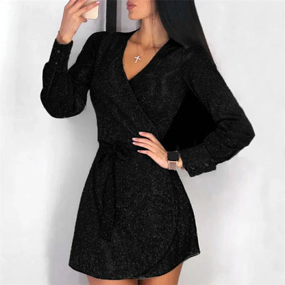 A glamorous midi dress with a lace overlay and sparkling silver sequin details, perfect for special occasions.