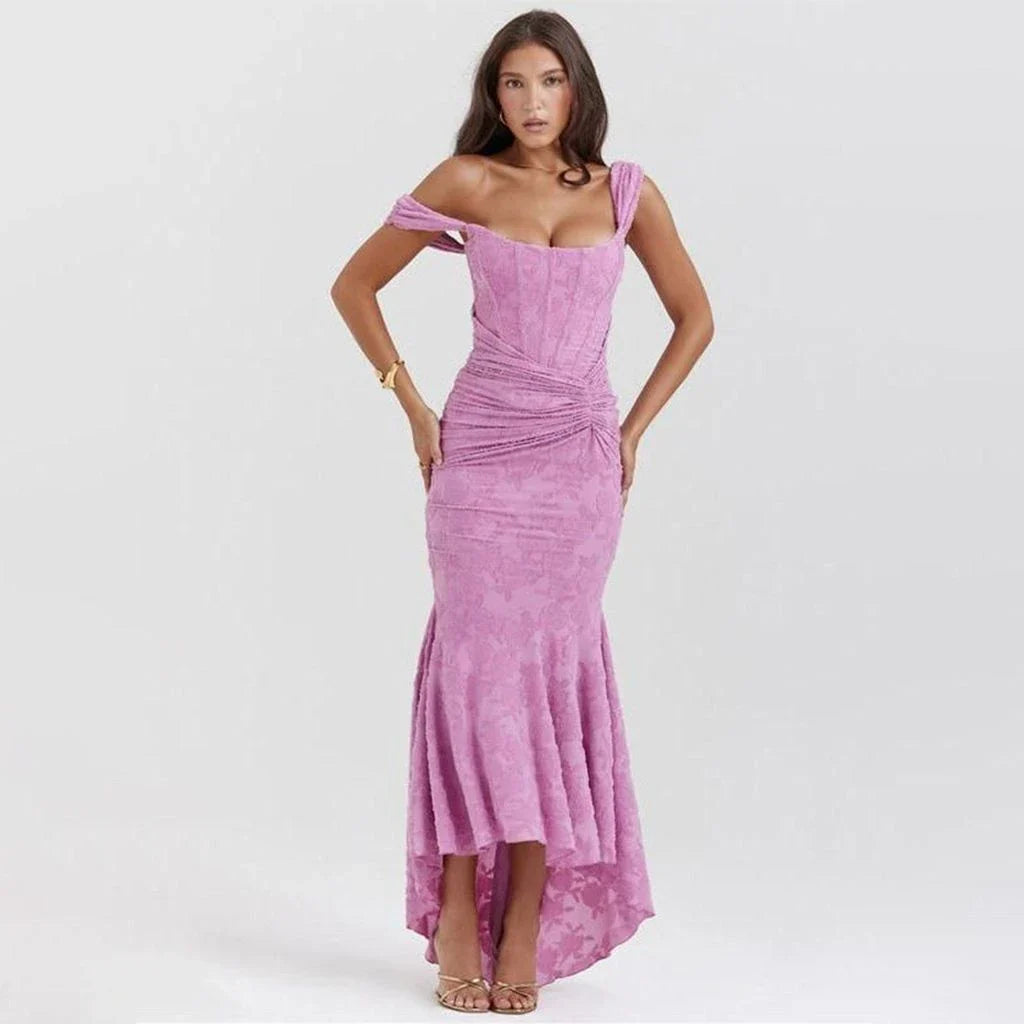 Elegant off-shoulder backless evening gown in purple, featuring ruched detailing and a flattering sheath silhouette.