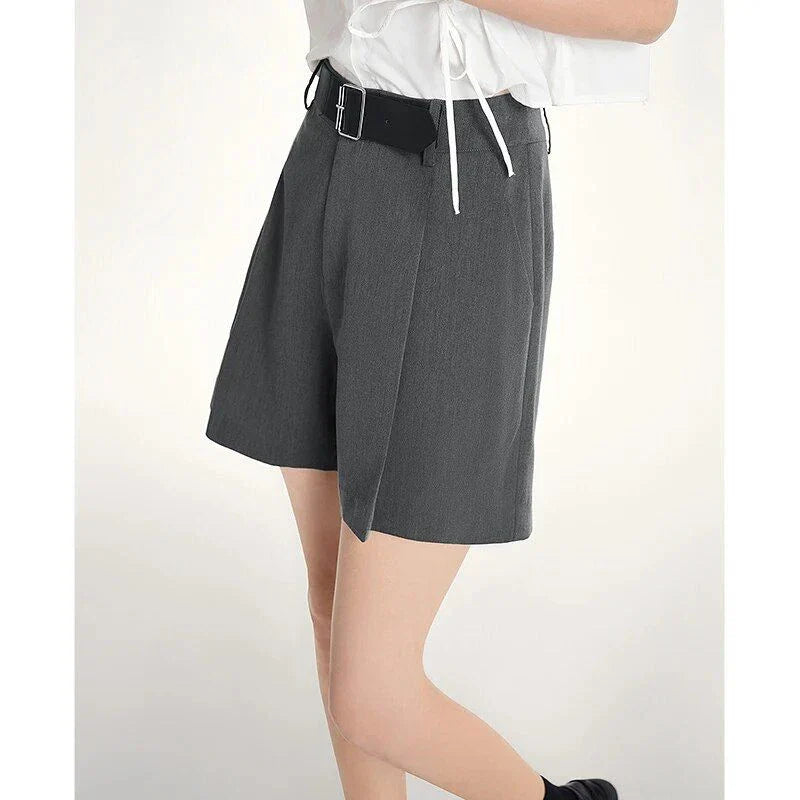 Elegant, high-waist harem shorts for women in the UK, featuring a relaxed, flowing silhouette and practical details for comfortable, stylish summer wear.