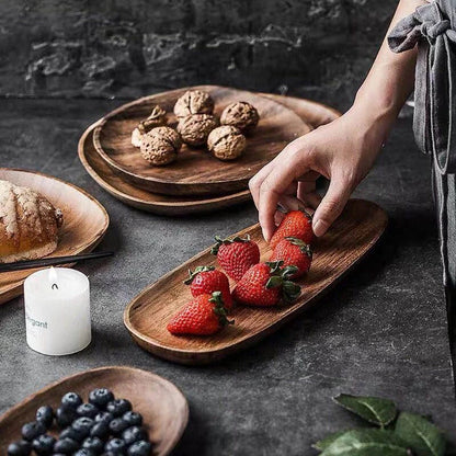 Elegant wooden dining plates with a minimalist, laconic design and natural wood grain