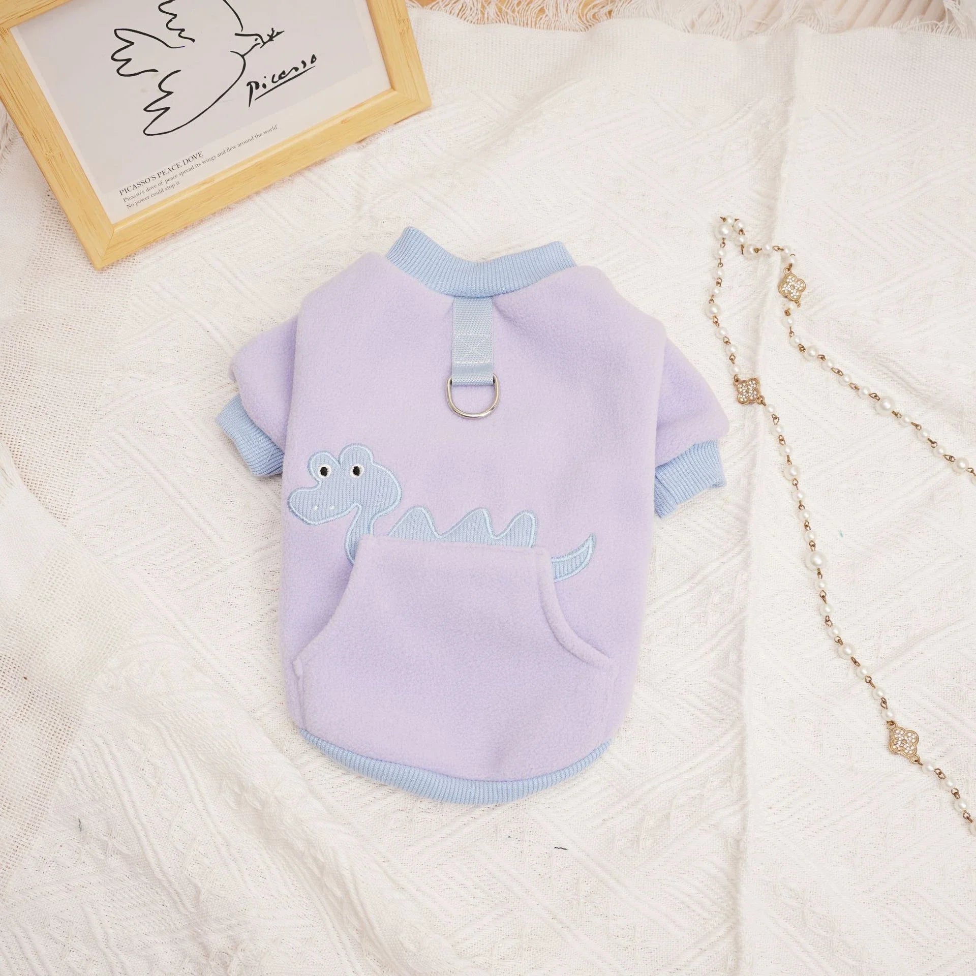 Plush and cosy pet clothing in various colours, designed for warmth and comfort