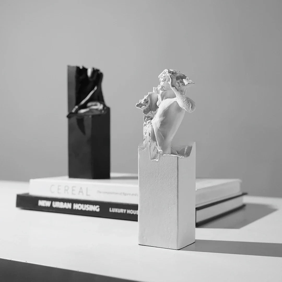 Elegant black and white abstract sculpture for desktop or study decor