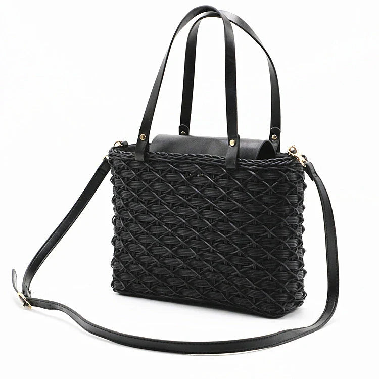 Handwoven rattan handbag in black with a sleek, elegant design for effortless style and practicality