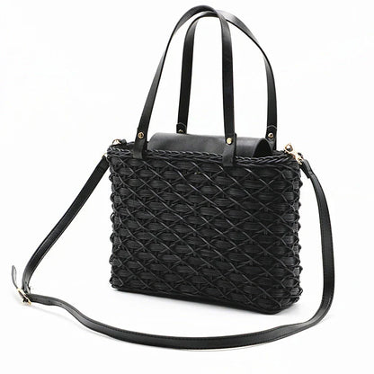 Handwoven rattan handbag in black with a sleek, elegant design for effortless style and practicality