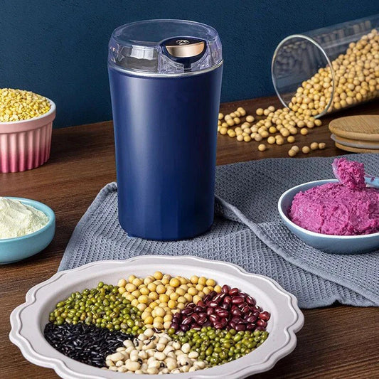 Compact electric coffee grinder with stainless steel blades for fast and even grinding of coffee beans, nuts, seeds, and spices