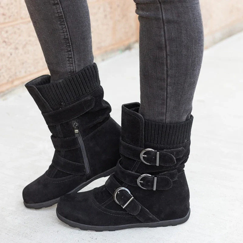 Durable cotton boots with resilient rubber soles, stylish car-stitch detailing, and cushioned artificial hair insole for all-day comfort.
