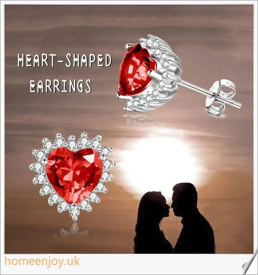 Elegant sterling silver earrings featuring a heart-shaped design and sparkling cubic zirconia stones