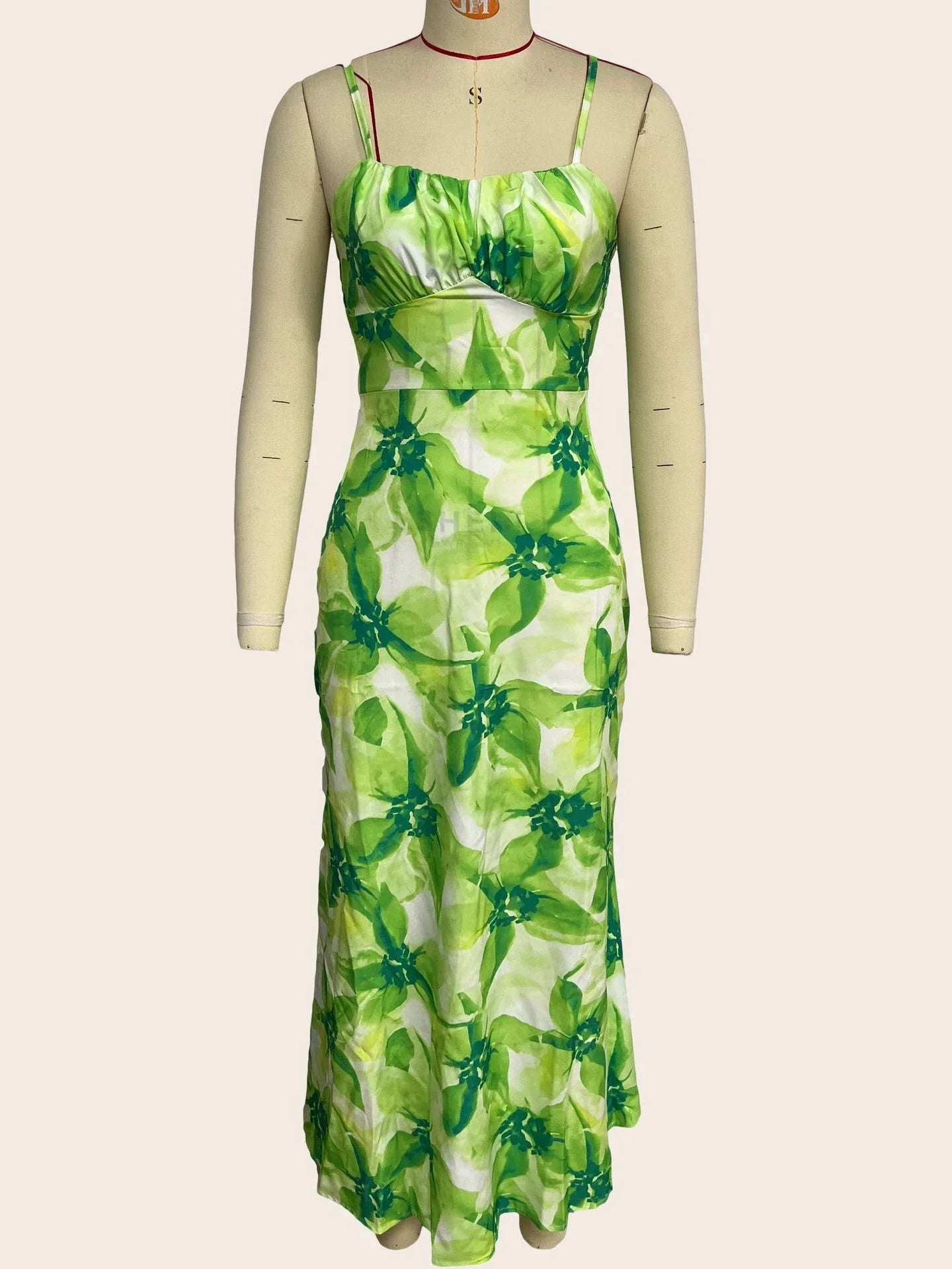 Elegant floral midi dress with backless design, available in yellow, purple, and green colours