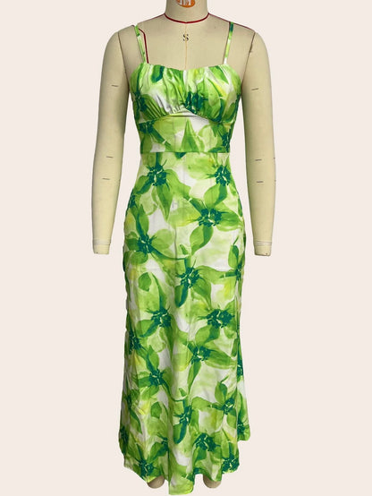 Elegant floral midi dress with backless design, available in yellow, purple, and green colours