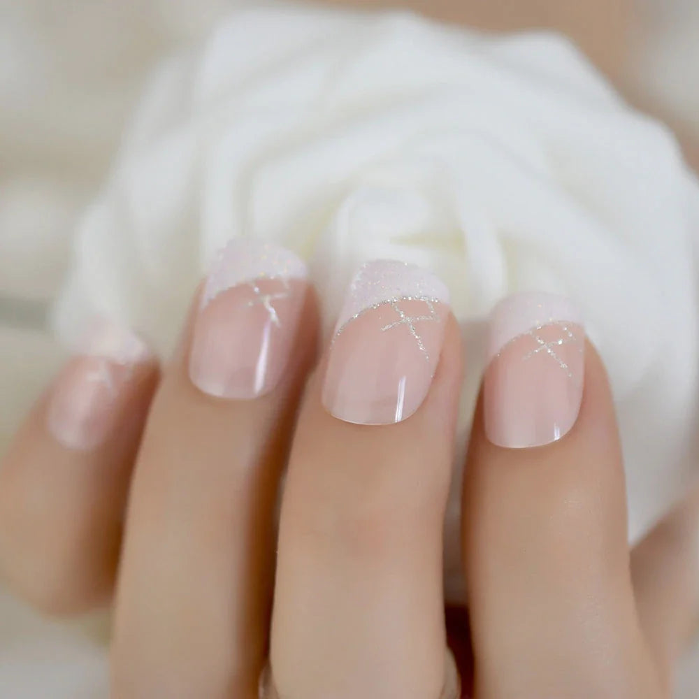 Iridescent white glitter short square French nail tips for a dazzling manicure