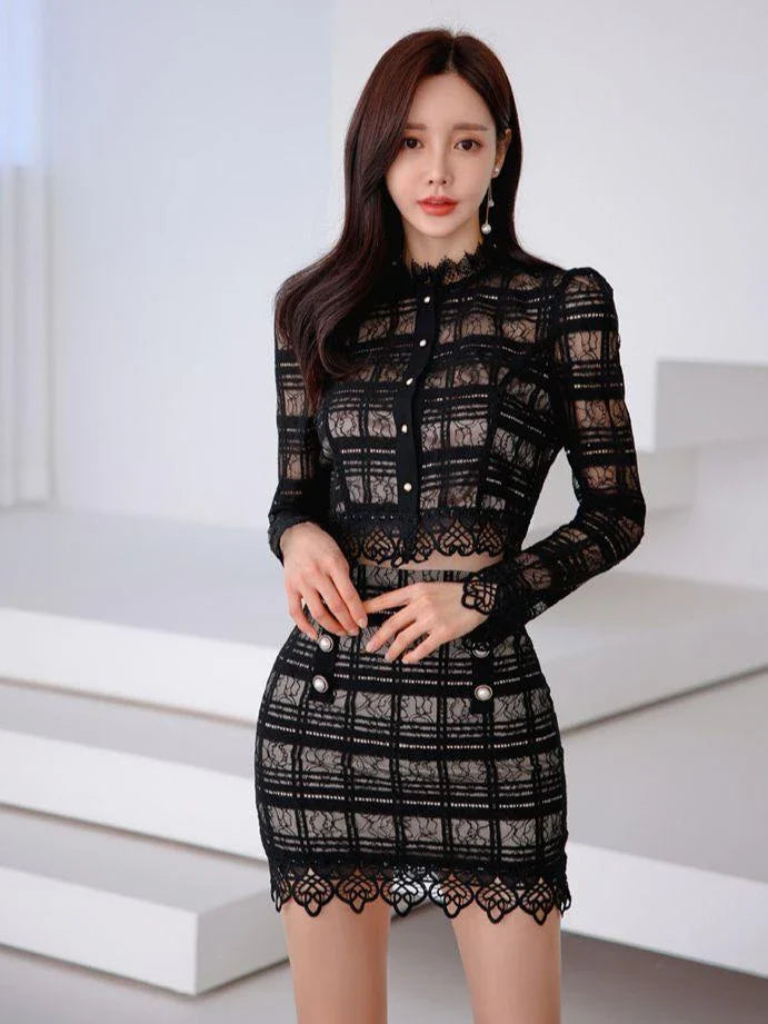 Elegant lace-trimmed two-piece suit with Chanel-inspired design and tailored stitching details