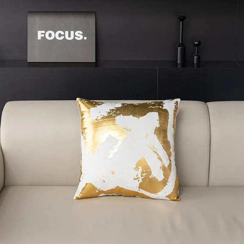 Pair of Nordic-inspired geometric plush pillowcases with a luxurious gold pattern on a white and black background