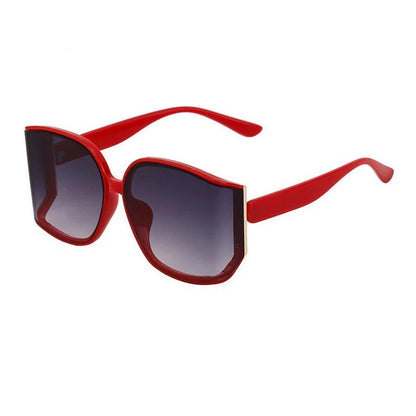 Chic and oversized square sunglasses with gradient lenses, providing UV protection and a stylish look for women