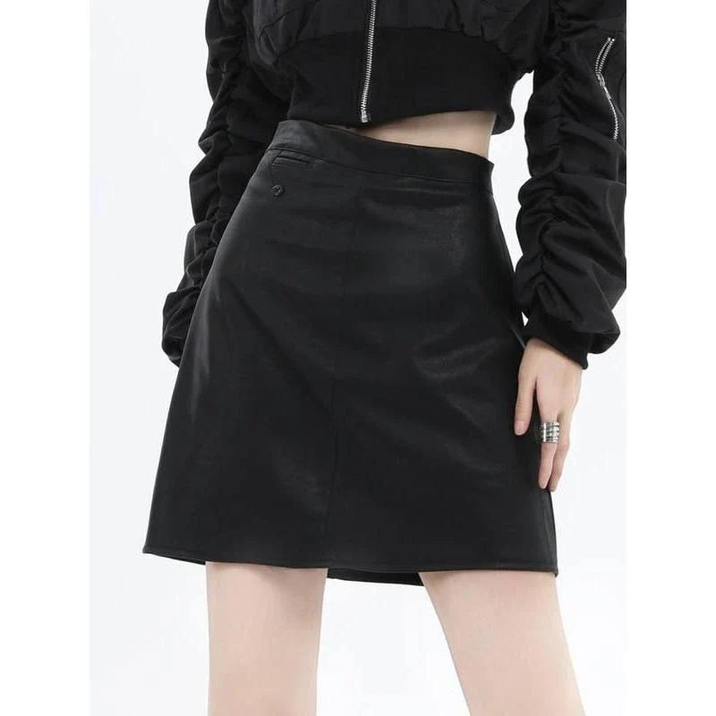 A chic faux leather high-waisted mini skirt in black, perfect for the modern British woman's autumn and winter wardrobe.