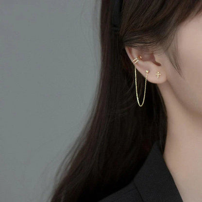 Asymmetric sterling silver one-piece earring and ear clip set with a modern and distinctive design
