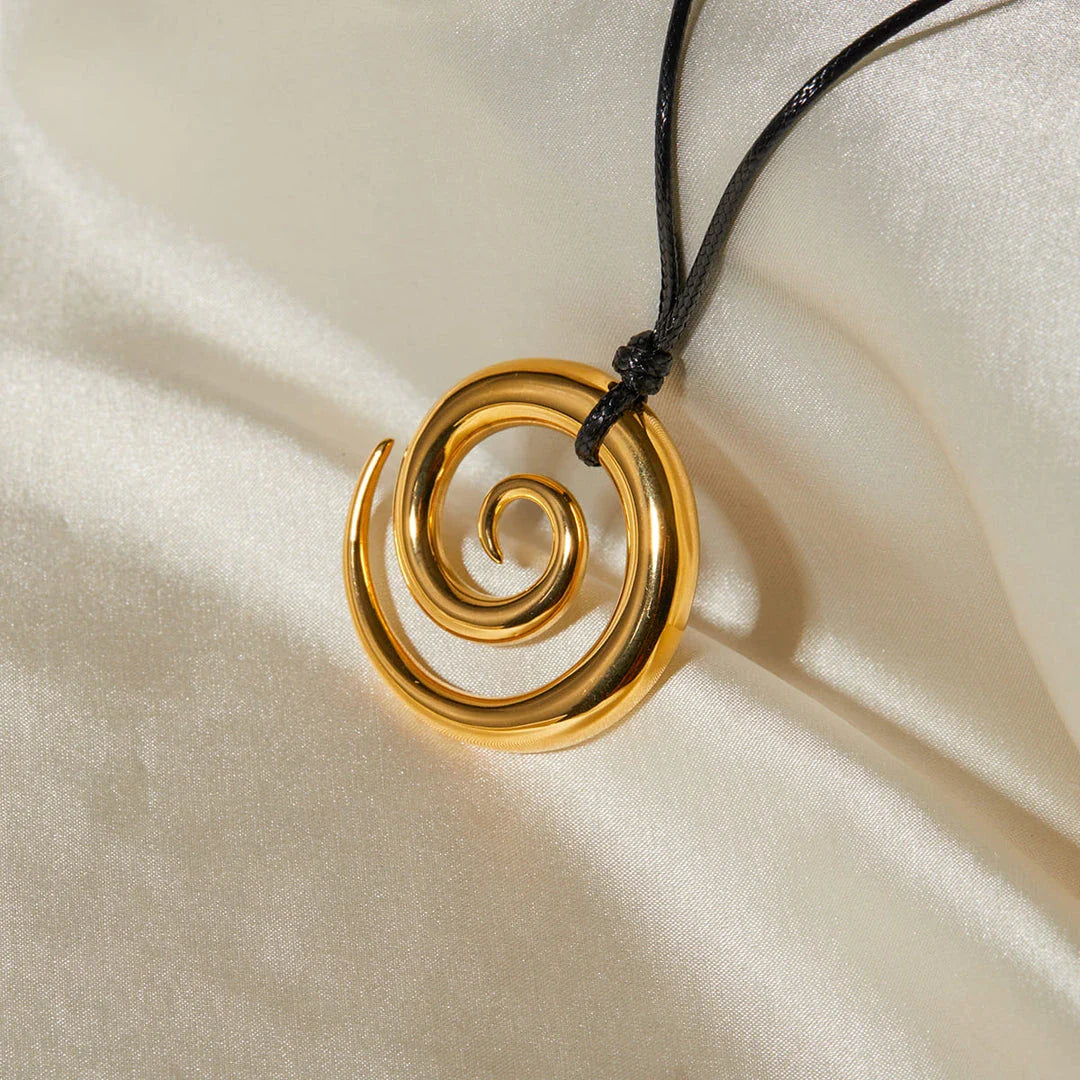 Elegant 18K gold-plated spiral circle pendant necklace made of premium stainless steel with a timeless design