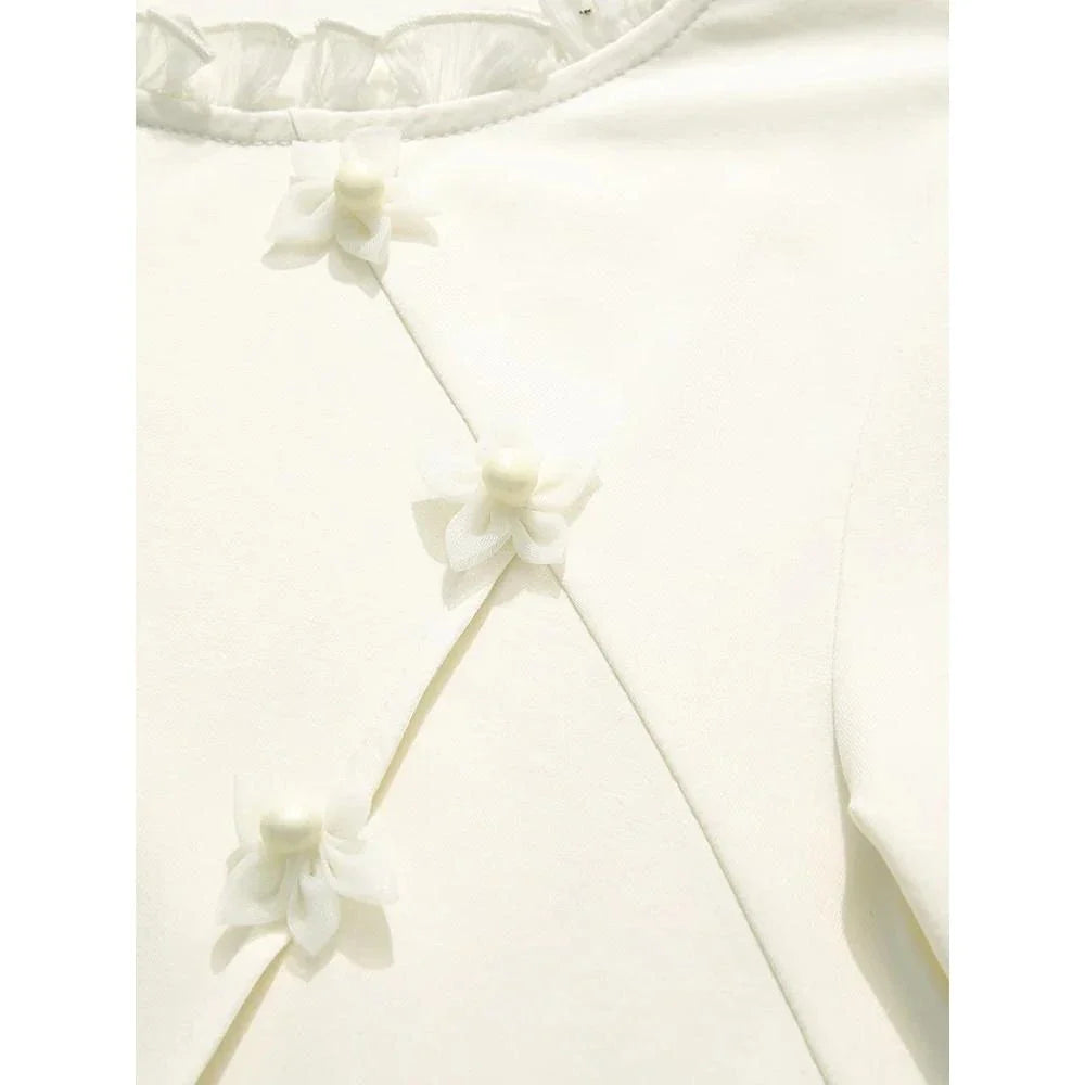 Elegant floral short sleeve t-shirt with wooden ear side detail, perfect for chic British summer style