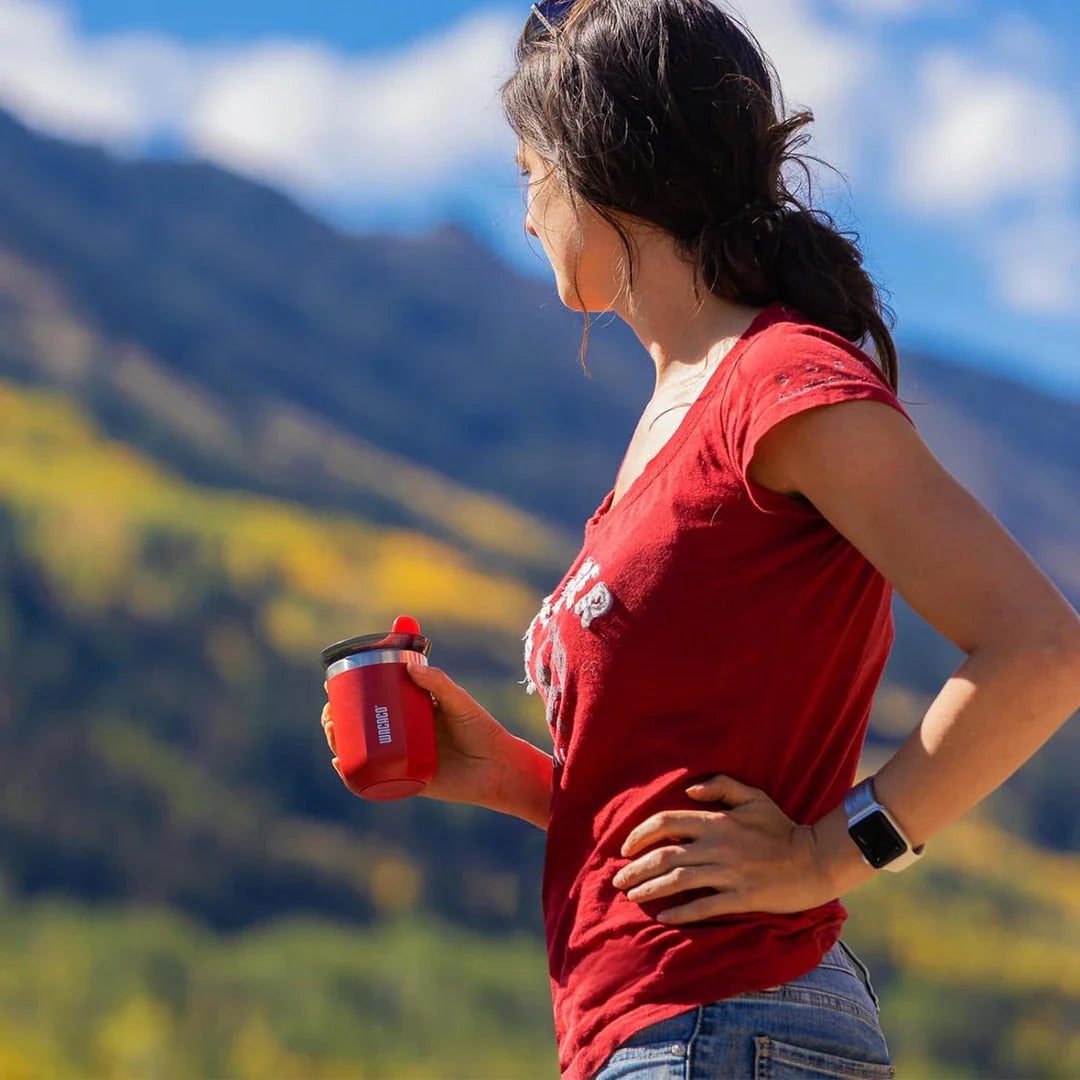 Premium insulated stainless steel travel mug in various vibrant colours, designed for keeping hot and cold drinks at the perfect temperature for on-the-go British lifestyles.