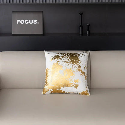 Pair of Nordic-inspired geometric plush pillowcases with a luxurious gold pattern on a white and black background