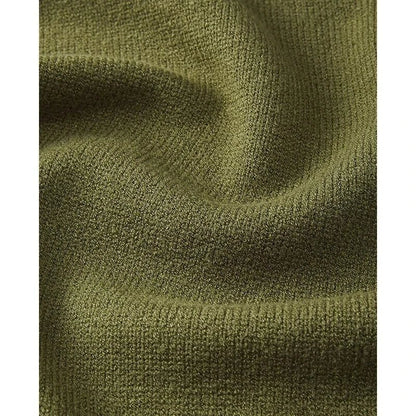 A cozy and chic knitted sleeveless vest in various colours, featuring a straight silhouette and a blend of premium materials for warmth and comfort.