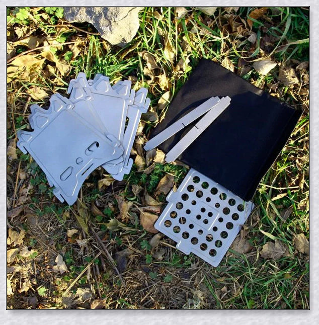 Compact titanium wood-fired camping stove with efficient air flow design and ultralight construction for easy portability