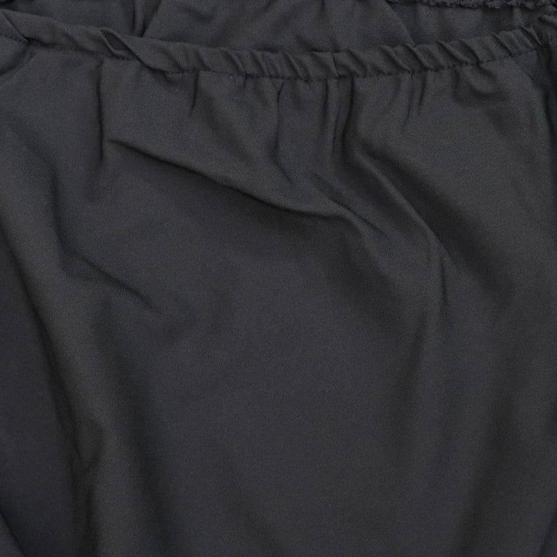 Elegant two-piece set with oblique shoulder blouse and midi skirt in black colour