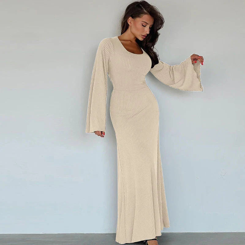 Elegant U-neck dress with lace-up back and flowing bell sleeves in a variety of sophisticated colours