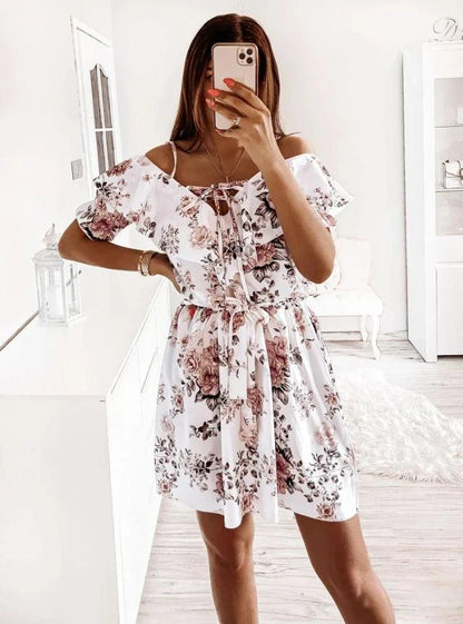 A stylish floral print dress with a flattering waist design, perfect for professional commuting