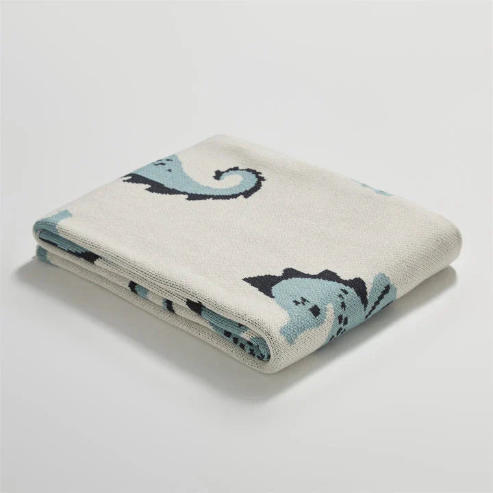Cosy Sea Horse Cotton Throw Blanket in pink and lake blue colours, featuring a playful sea horse pattern and jacquard weave design.