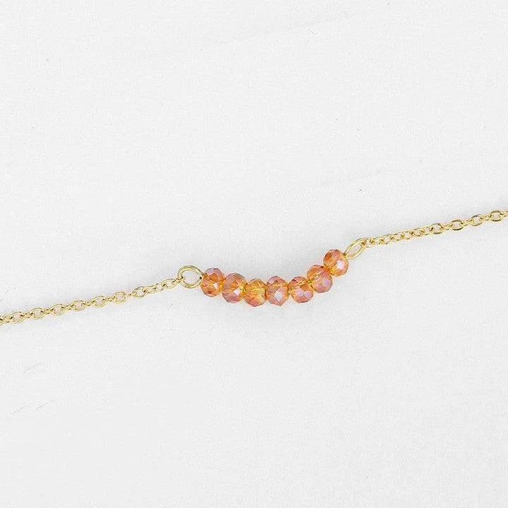 Elegant geometric long necklace made from premium stainless steel, featuring a delicate chain and captivating design for refined British style.