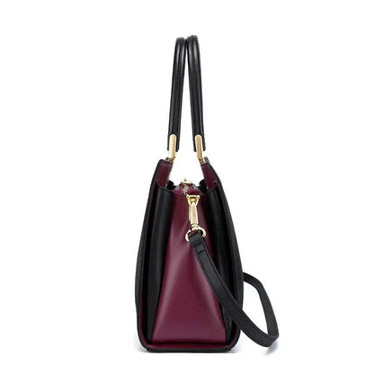 Elegant premium genuine leather tote bag with spacious interior, multiple compartments, and a secure zipper closure for everyday use