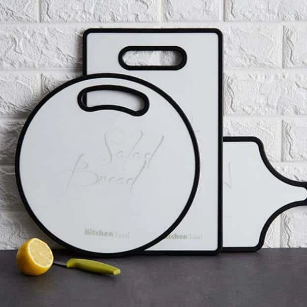 Premium walnut wood cutting boards in rectangle, handle, and round shapes for versatile kitchen use