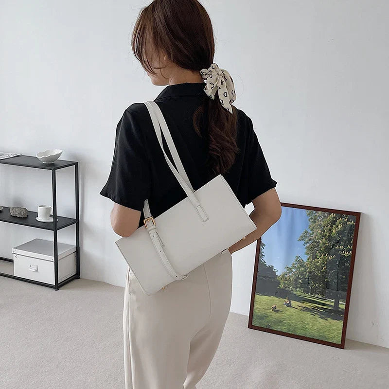A premium polyester tote bag in a variety of colours, featuring a stylish Japanese and Korean-inspired design for the modern British shopper.