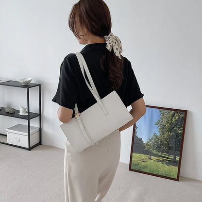 A premium polyester tote bag in a variety of colours, featuring a stylish Japanese and Korean-inspired design for the modern British shopper.
