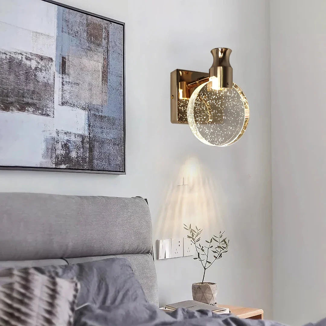 Elegant crystal LED wall lamp with copper body and glass shade, offering warm, cool, and neutral lighting modes for versatile home decor