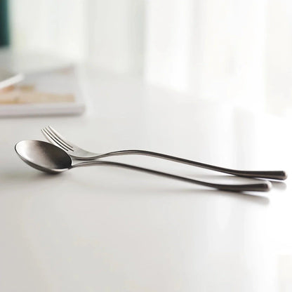 Elegant retro stainless steel cutlery set with sleek silver finish and solid pattern for sophisticated British dining