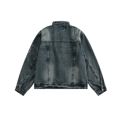 Retro-inspired men's denim jacket with intricate embroidered detailing, perfect for casual and smart-casual outfits