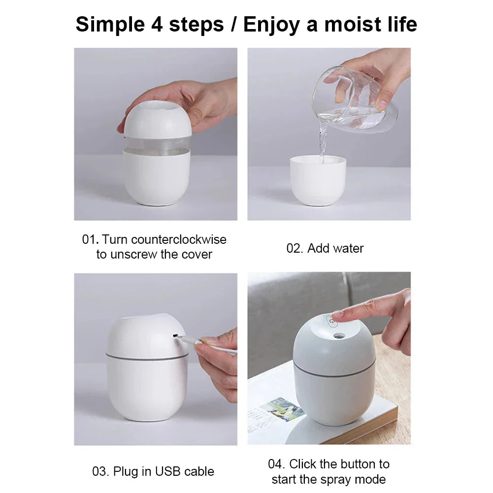 Compact ultrasonic humidifier and aroma diffuser with LED night light, designed for use in home or office spaces.