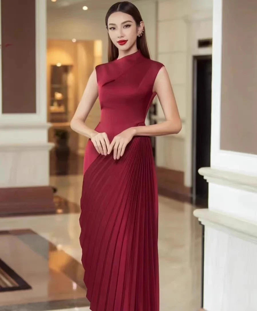 Elegant asymmetric dress in wine red and milky white with a half turtleneck design, perfect for autumn and winter wear.