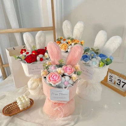 A delightful knitted rabbit bouquet doll in vibrant colours, featuring soft plush materials and a charming design