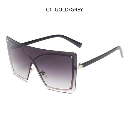 Stylish oversized flat top sunglasses with a rimless design, providing UV protection and a comfortable fit for the modern British woman