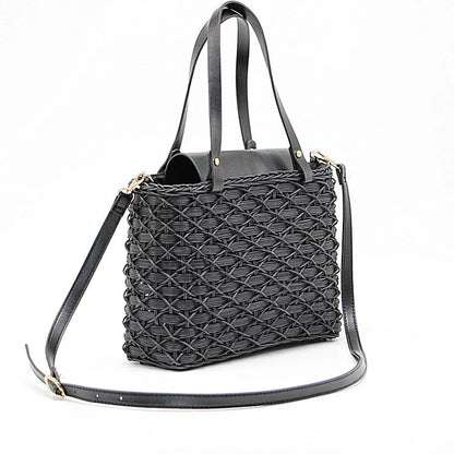 Handwoven rattan handbag in black with a sleek, elegant design for effortless style and practicality