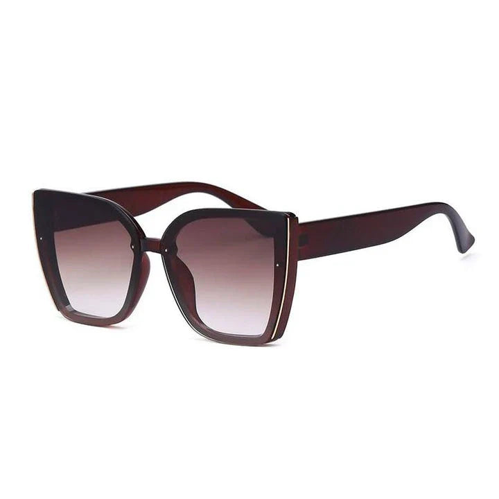 Chic oversized cat eye sunglasses with a vintage-inspired design and UV400 protection for stylish British women