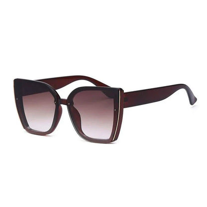 Chic oversized cat eye sunglasses with a vintage-inspired design and UV400 protection for stylish British women