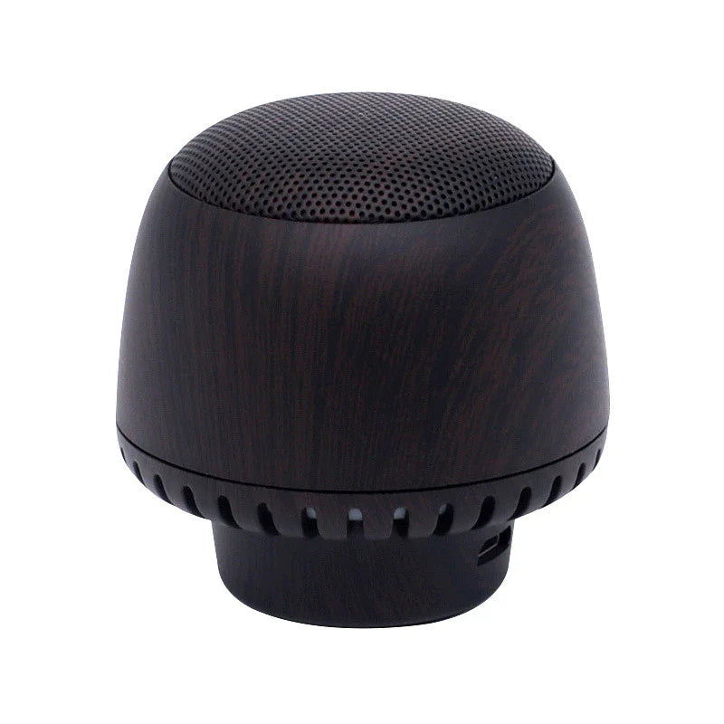 Compact wireless Bluetooth speaker with mushroom-inspired bionic design and night light function