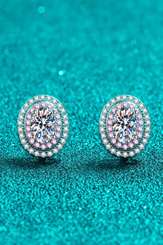 Elegant platinum-plated moissanite stud earrings with a minimalist design and sparkling stones