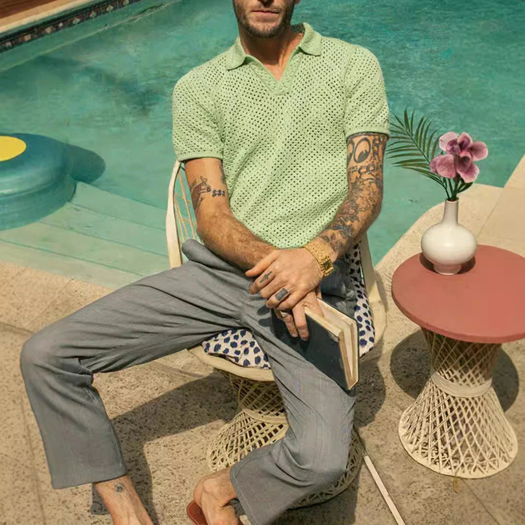 A stylish and comfortable men's knitted shirt in a classic British design, made from premium polyester fabric for breathability and softness.