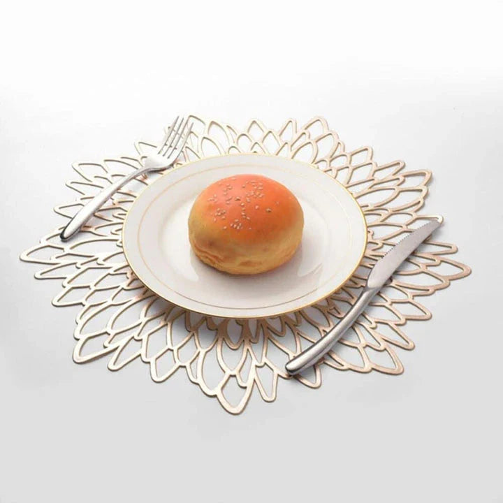 Elegant floral-patterned PVC dining table coaster in a contemporary setting, protecting a wooden table surface